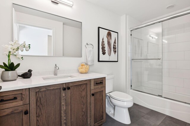 222 Ferndale Rd S, Wayzata, MN 55391 - bathroom featuring vanity, shower / bath combination with glass door, and tile patterned flooring