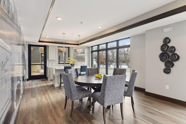 222 Ferndale Rd S, Wayzata, MN 55391 - dining area with wood finished floors, recessed lighting, and a raised ceiling