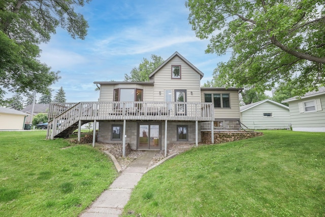 17 Lake St, Osakis, MN 56360 - rear view of house featuring a deck, stairs, and a lawn