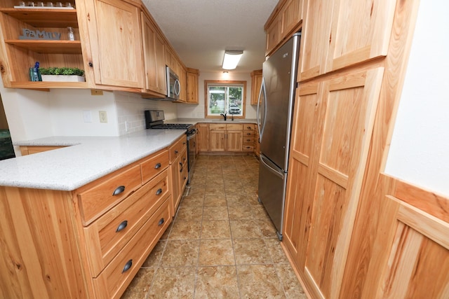 17 Lake St, Osakis, MN 56360 - kitchen featuring stainless steel appliances, open shelves, light stone finish floors, light brown cabinets, and light stone counters