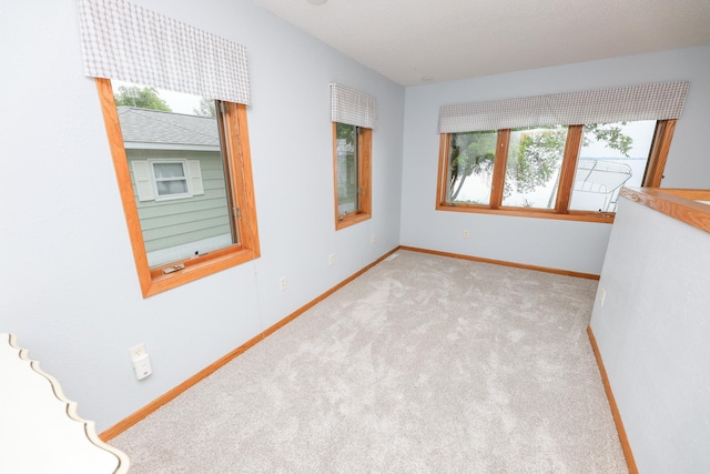 17 Lake St, Osakis, MN 56360 - carpeted empty room featuring healthy amount of natural light