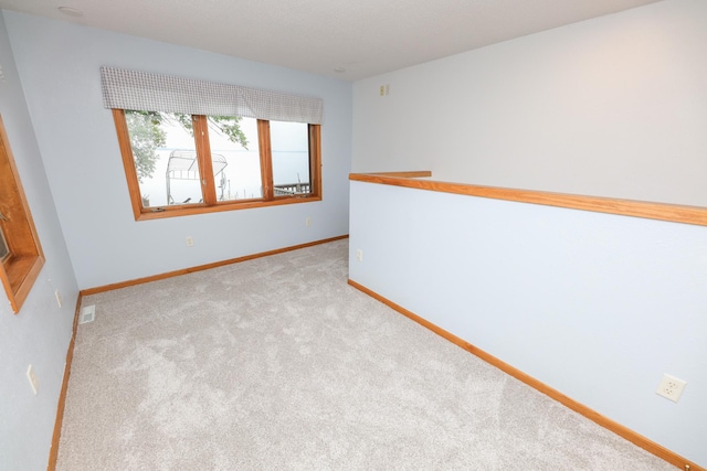 17 Lake St, Osakis, MN 56360 - unfurnished room featuring carpet flooring and baseboards