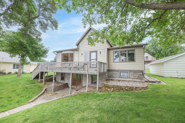 17 Lake St, Osakis, MN 56360 - back of house featuring a deck and a lawn