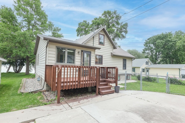 17 Lake St, Osakis, MN 56360 - view of front of home with a wooden deck and a gate