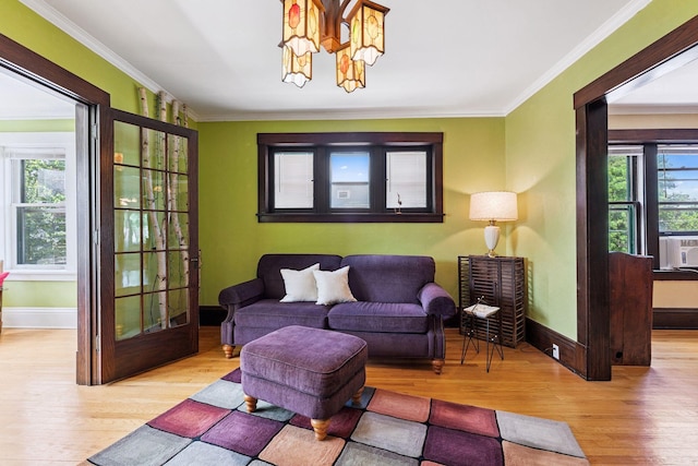 1725 Hague Ave Unit 4, Saint Paul, MN 55104 - living room featuring wood finished floors, a chandelier, ornamental molding, and cooling unit