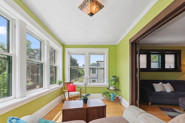 1725 Hague Ave Unit 4, Saint Paul, MN 55104 - sunroom / solarium with wood finished floors, healthy amount of natural light, and crown molding