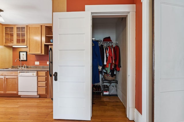 1725 Hague Ave Unit 4, Saint Paul, MN 55104 - kitchen featuring dishwasher, light wood-style flooring, glass insert cabinets, and open shelves