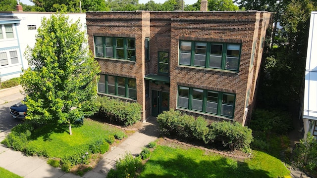 1725 Hague Ave Unit 4, Saint Paul, MN 55104 - view of front of property with brick siding and a chimney