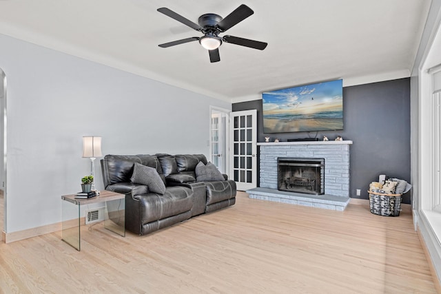 957 Hall Ave W, Saint Paul, MN 55118 - living area with wood finished floors, ceiling fan, and a fireplace