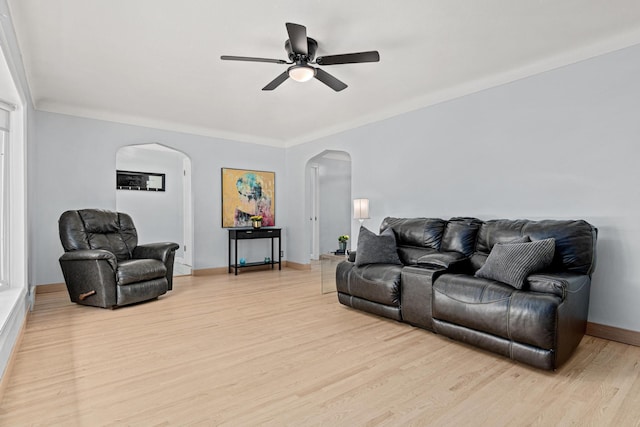957 Hall Ave W, Saint Paul, MN 55118 - living area with arched walkways, light wood-style floors, and ceiling fan