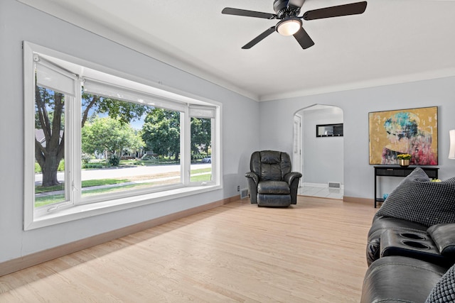 957 Hall Ave W, Saint Paul, MN 55118 - living area with arched walkways, wood finished floors, and ceiling fan