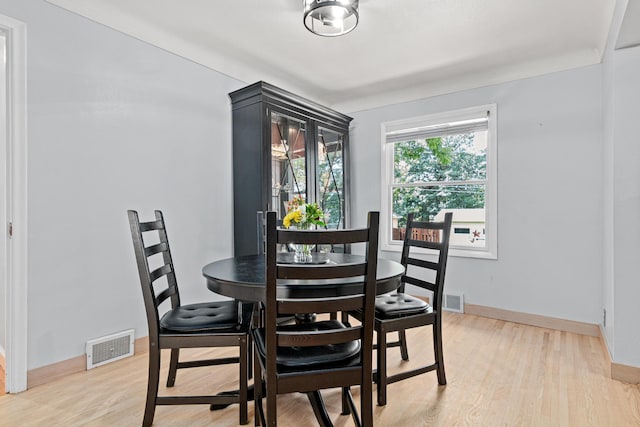 957 Hall Ave W, Saint Paul, MN 55118 - dining area with light wood finished floors and baseboards