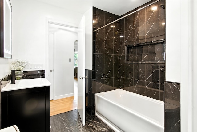 957 Hall Ave W, Saint Paul, MN 55118 - full bath with vanity, marble finish floors, and tub / shower combination