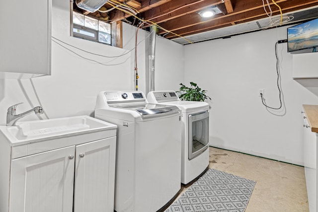 957 Hall Ave W, Saint Paul, MN 55118 - washroom featuring independent washer and dryer and cabinet space
