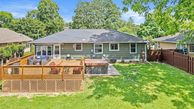 957 Hall Ave W, Saint Paul, MN 55118 - back of house with a fenced backyard, a wooden deck, roof with shingles, outdoor lounge area, and a chimney
