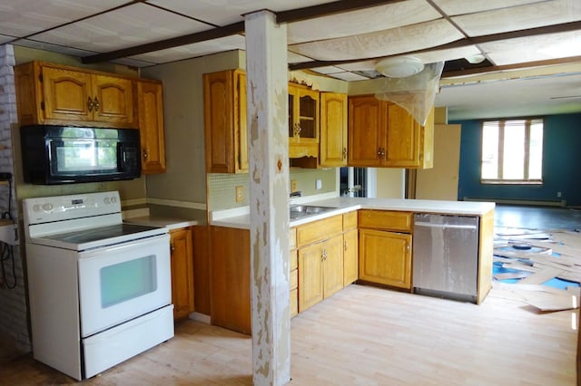 2332 7th St, Superior, WI 54880 - kitchen featuring black microwave, electric stove, dishwasher, a peninsula, and light wood-style flooring