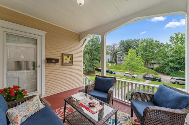 2145 Knapp St, Saint Paul, MN 55108 - porch featuring an outdoor hangout area