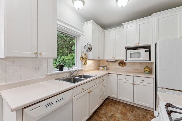 2145 Knapp St, Saint Paul, MN 55108 - kitchen featuring white appliances, white cabinetry, light countertops, decorative backsplash, and stone finish floors