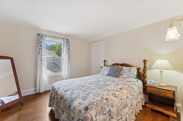 2145 Knapp St, Saint Paul, MN 55108 - bedroom featuring wood finished floors and baseboards