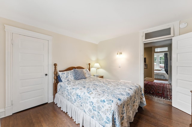 2145 Knapp St, Saint Paul, MN 55108 - bedroom featuring dark wood-style flooring