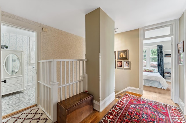 2145 Knapp St, Saint Paul, MN 55108 - foyer with light wood-style flooring and wallpapered walls