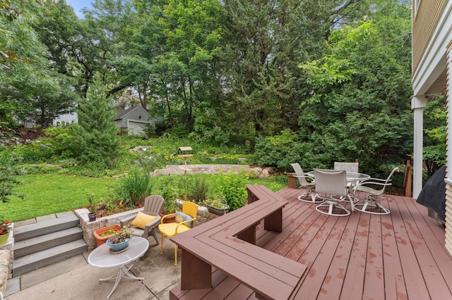 2145 Knapp St, Saint Paul, MN 55108 - wooden deck featuring outdoor dining area