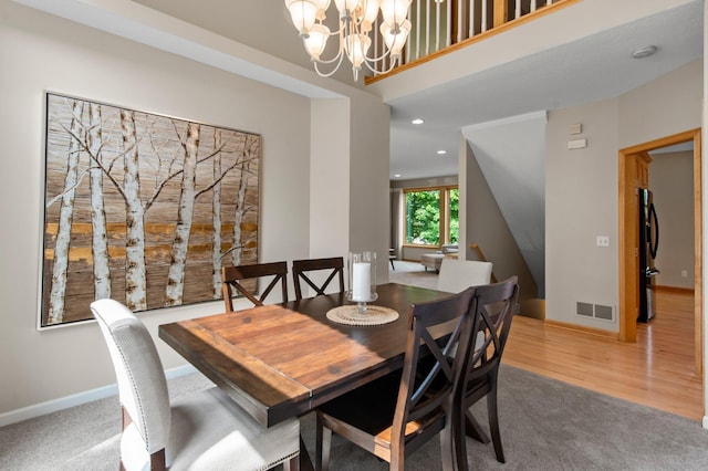 3933 Donegal Way, Eagan, MN 55122 - dining area featuring carpet flooring, a chandelier, and recessed lighting