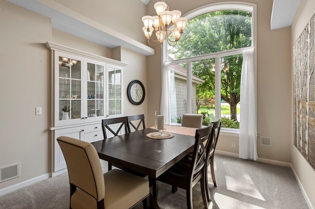3933 Donegal Way, Eagan, MN 55122 - dining area with a chandelier and light colored carpet