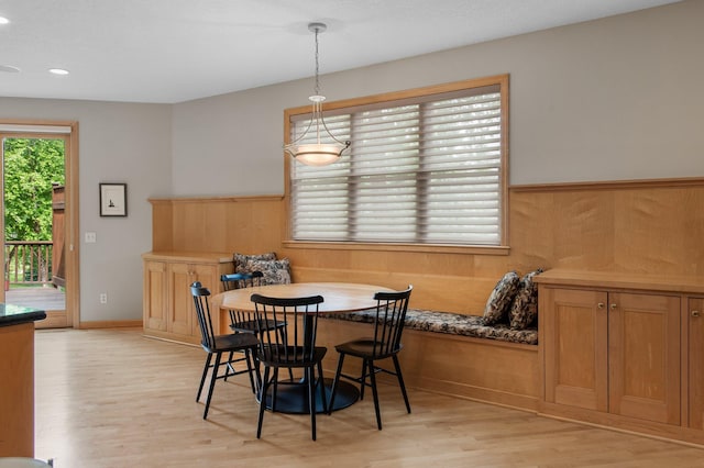 3933 Donegal Way, Eagan, MN 55122 - dining area with light wood finished floors, recessed lighting, and wainscoting