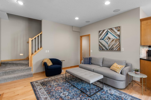 3933 Donegal Way, Eagan, MN 55122 - living area featuring stairway, wood finished floors, and recessed lighting