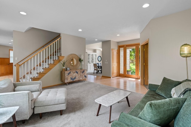 3933 Donegal Way, Eagan, MN 55122 - living room with recessed lighting, stairs, light carpet, and light wood finished floors