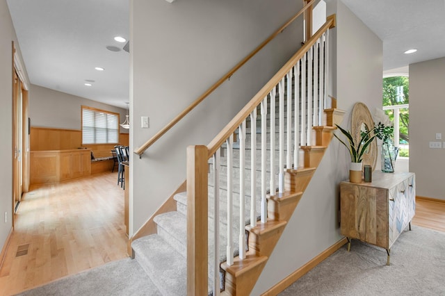 3933 Donegal Way, Eagan, MN 55122 - stairs with recessed lighting, a wainscoted wall, and wood finished floors