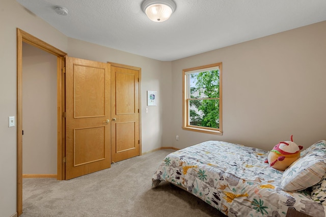 3933 Donegal Way, Eagan, MN 55122 - bedroom featuring light colored carpet and baseboards