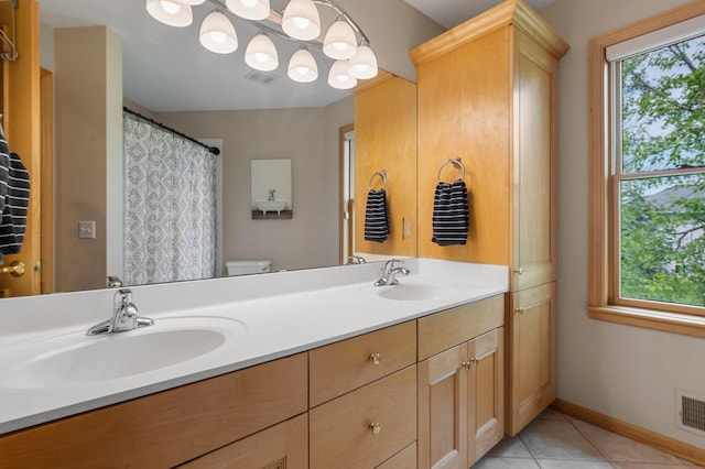 3933 Donegal Way, Eagan, MN 55122 - full bath featuring double vanity and tile patterned floors