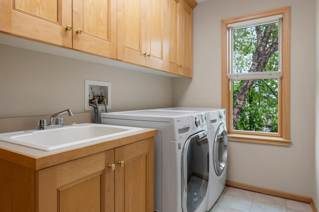 3933 Donegal Way, Eagan, MN 55122 - laundry room featuring cabinet space, independent washer and dryer, and light tile patterned flooring