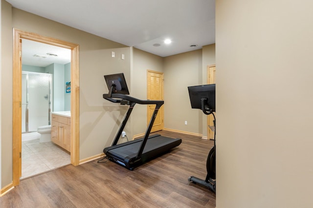 3933 Donegal Way, Eagan, MN 55122 - exercise area featuring light wood-style flooring and baseboards