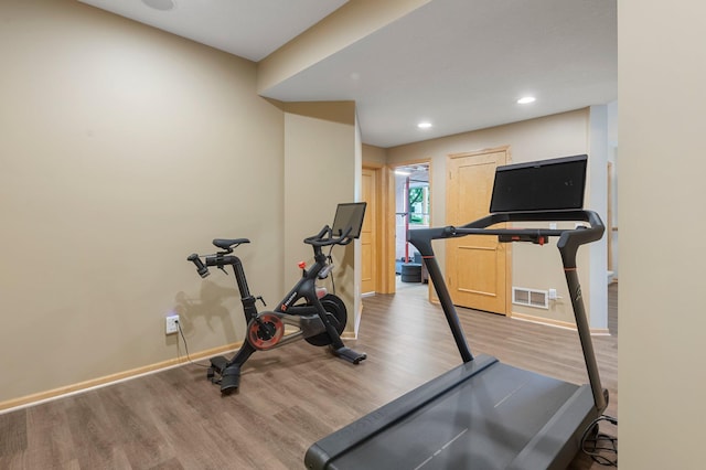 3933 Donegal Way, Eagan, MN 55122 - exercise room with wood finished floors and recessed lighting