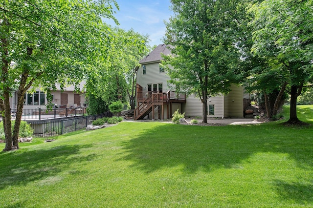 3933 Donegal Way, Eagan, MN 55122 - view of yard with stairs and a deck