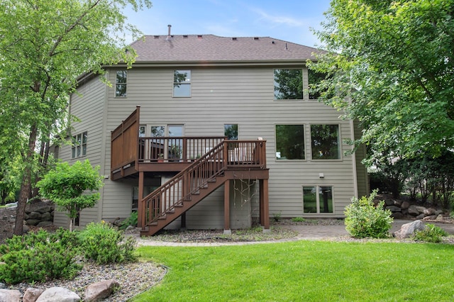 3933 Donegal Way, Eagan, MN 55122 - rear view of house with stairway, a deck, a yard, and roof with shingles