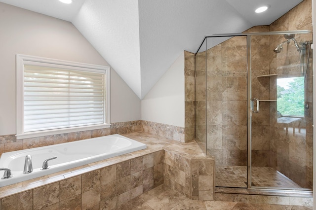 3933 Donegal Way, Eagan, MN 55122 - bathroom featuring vaulted ceiling, a bath, a stall shower, and recessed lighting