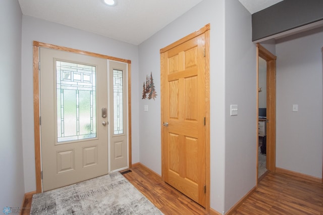 633 Leonards Way, Argusville, ND 58005 - foyer entrance featuring wood finished floors and baseboards
