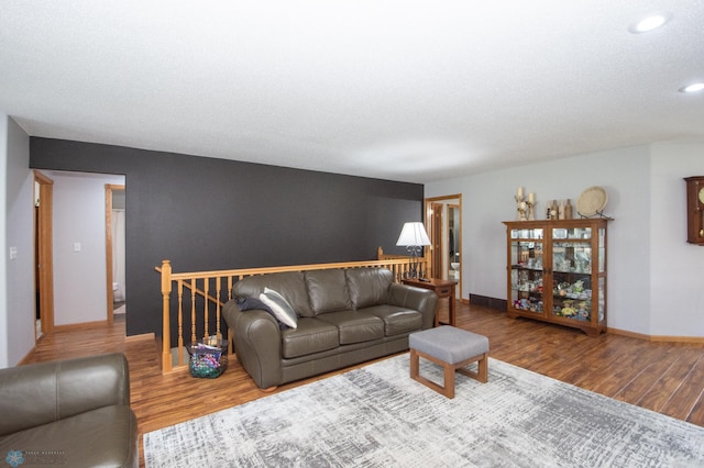 633 Leonards Way, Argusville, ND 58005 - living room featuring wood finished floors and recessed lighting