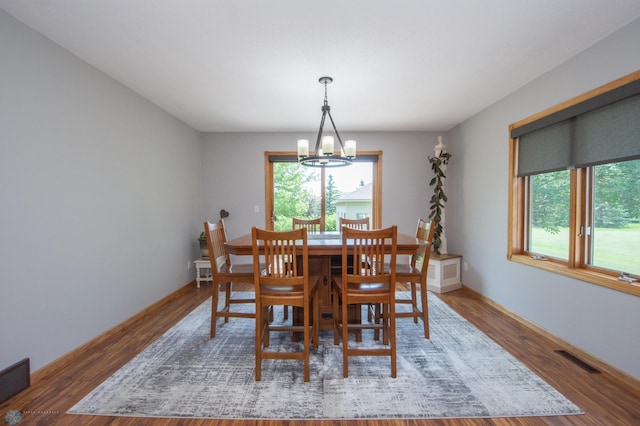 633 Leonards Way, Argusville, ND 58005 - dining space with a chandelier and wood finished floors