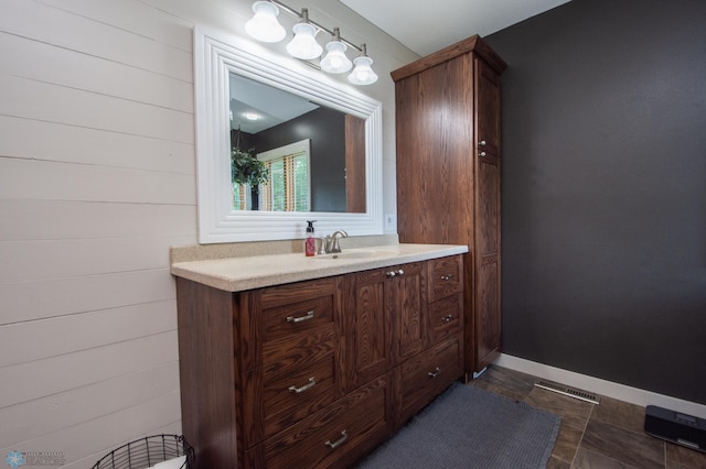 633 Leonards Way, Argusville, ND 58005 - bathroom with vanity and baseboards