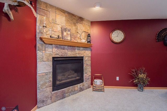 633 Leonards Way, Argusville, ND 58005 - carpeted living room featuring a fireplace and baseboards