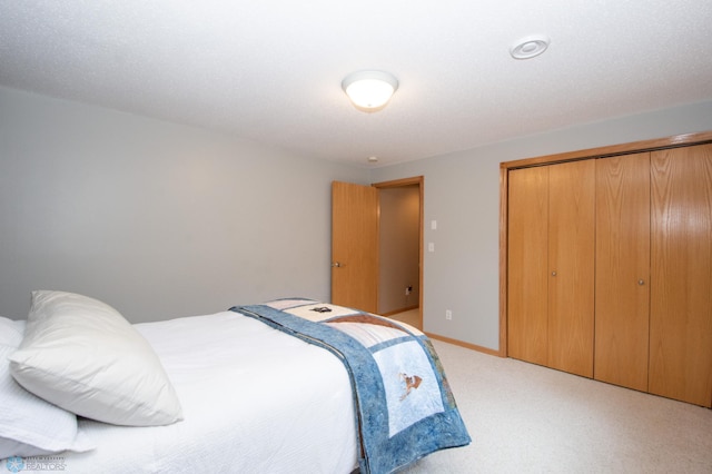 633 Leonards Way, Argusville, ND 58005 - bedroom with light carpet and a closet