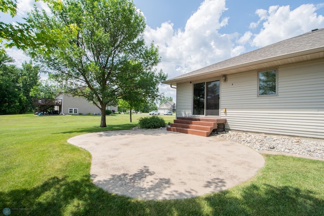633 Leonards Way, Argusville, ND 58005 - view of green lawn featuring a patio