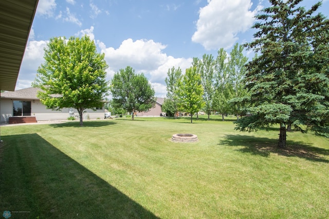 633 Leonards Way, Argusville, ND 58005 - view of grassy yard featuring a fire pit