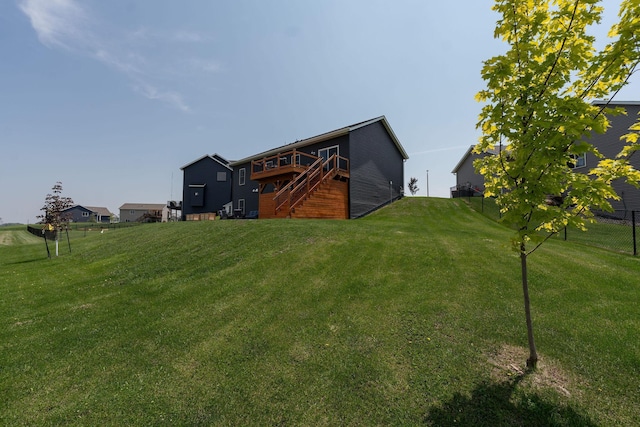 695 Marcus Pl NE, Byron, MN 55920 - view of yard featuring stairway and a deck