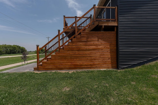 695 Marcus Pl NE, Byron, MN 55920 - deck featuring stairs and a lawn